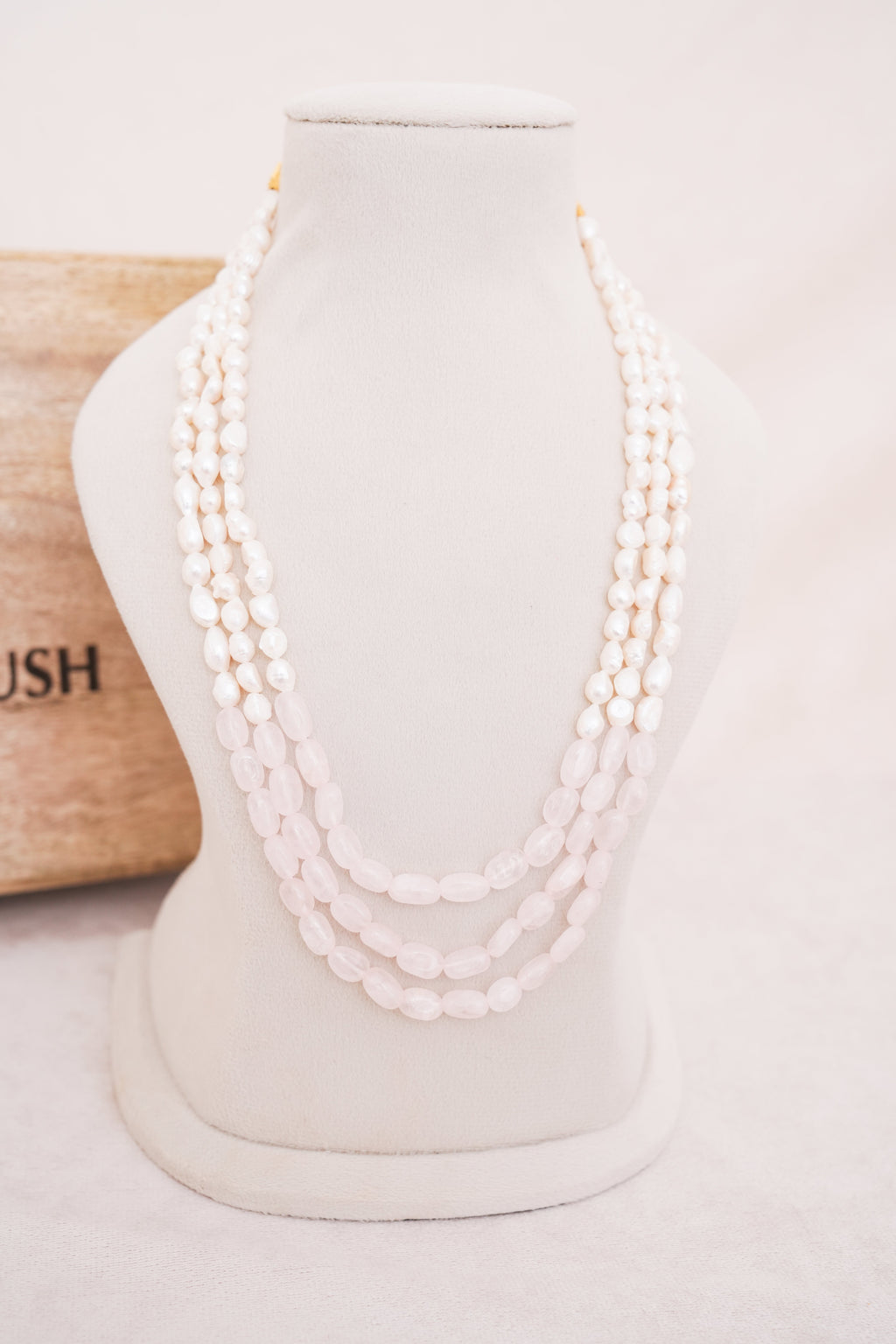 Elegant Multi-Strand Pearl with Rose quartz centre Necklace