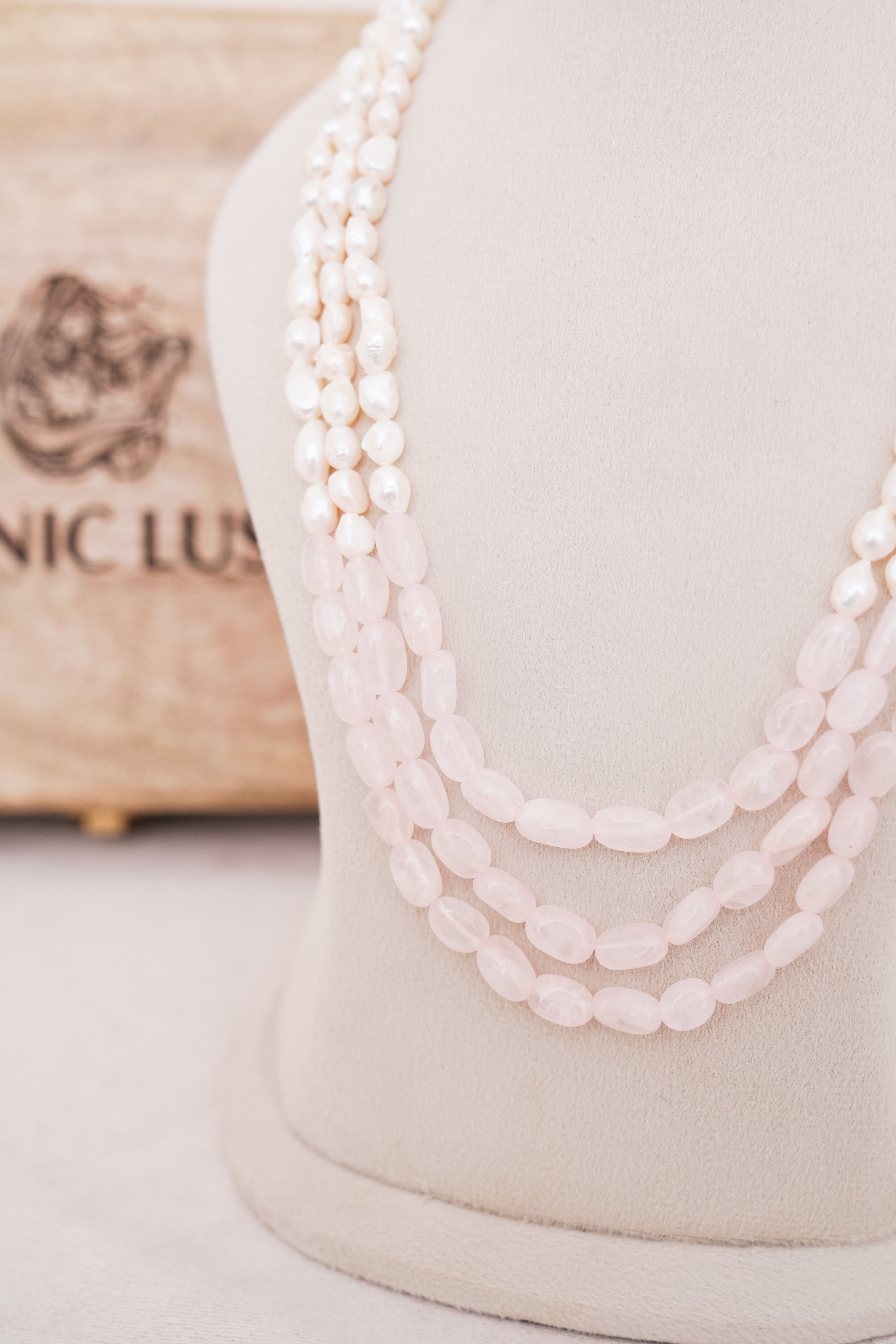 Elegant Multi-Strand Pearl with Rose quartz centre Necklace