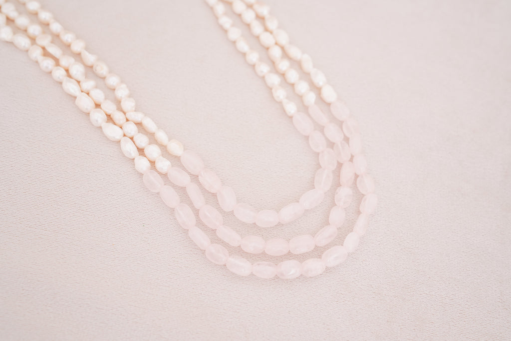 Elegant Multi-Strand Pearl with Rose quartz centre Necklace