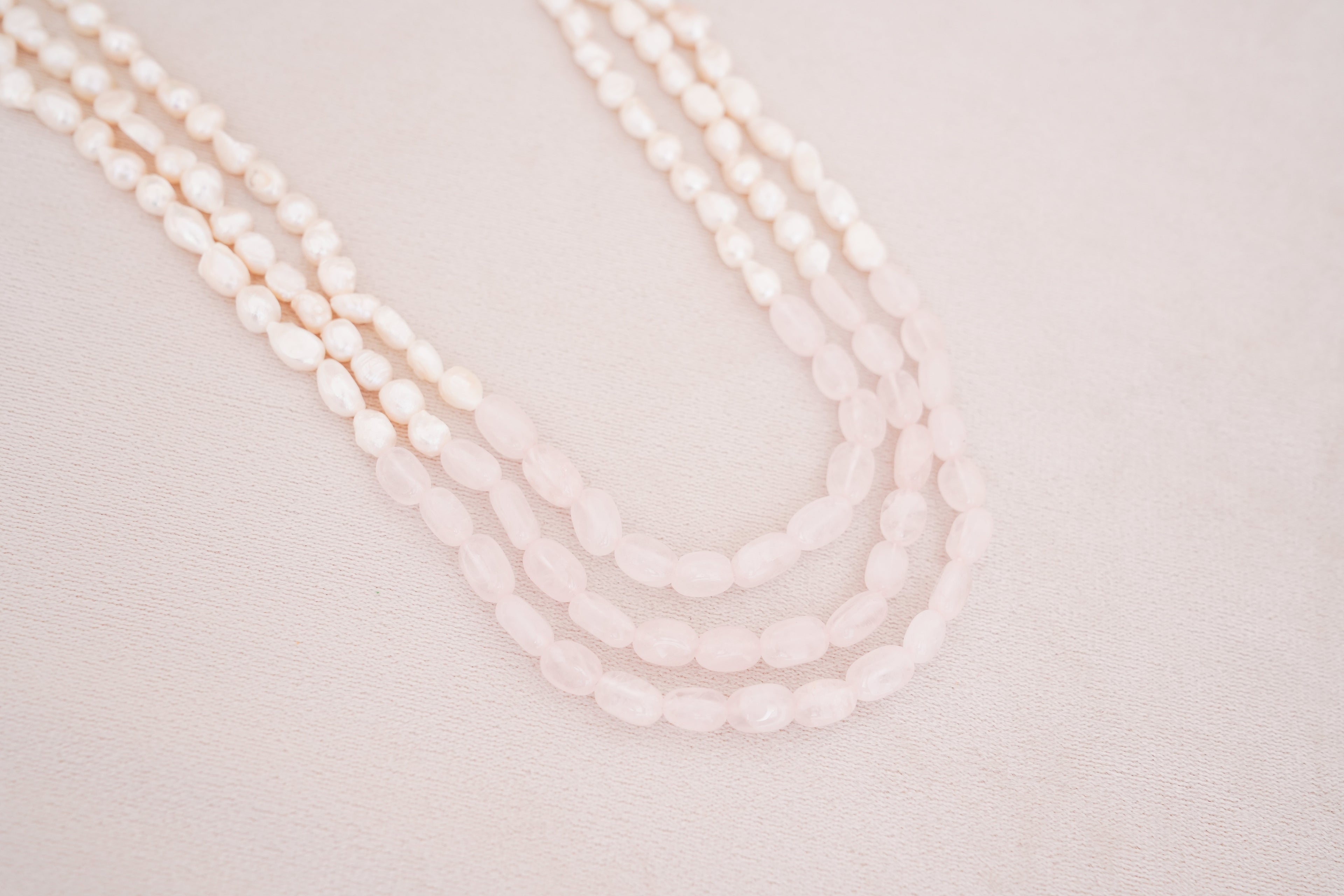 Elegant Multi-Strand Pearl with Rose quartz centre Necklace