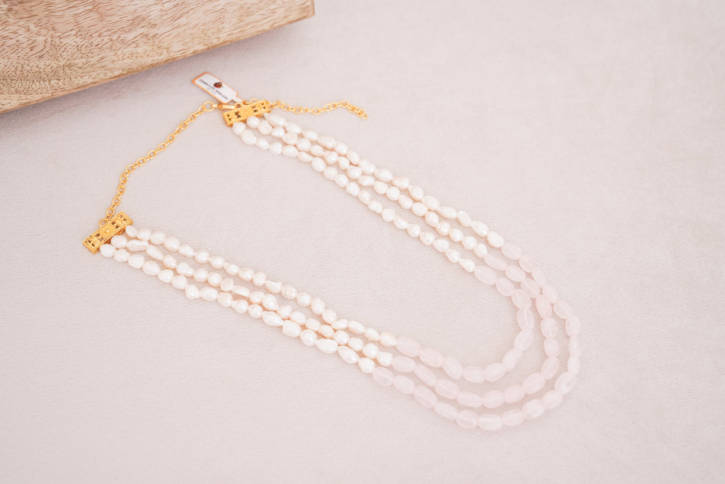 Elegant Multi-Strand Pearl with Rose quartz centre Necklace