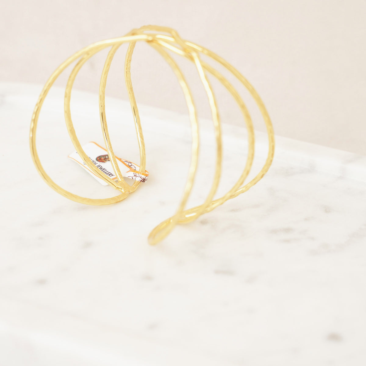 Hammered Gold Crisscross Cuff