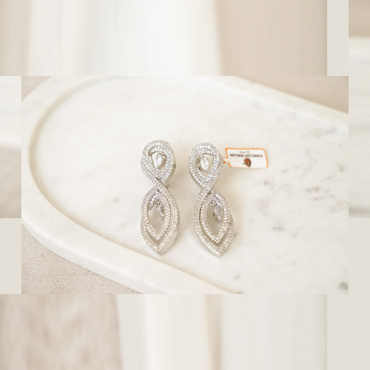 Crystal Infinity Swirl Drop Earrings