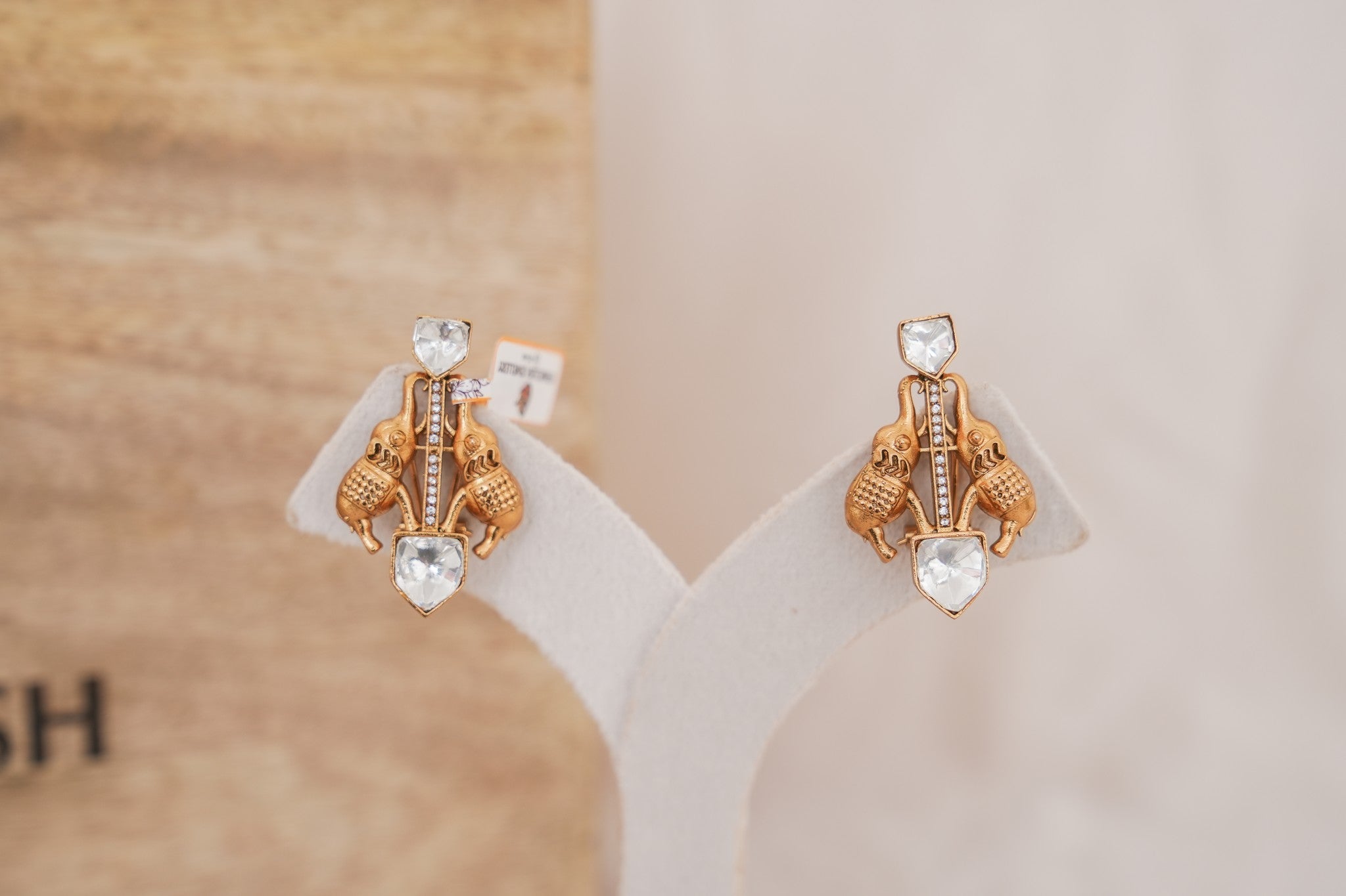 Gold Elephant Motif Stud Earrings detail