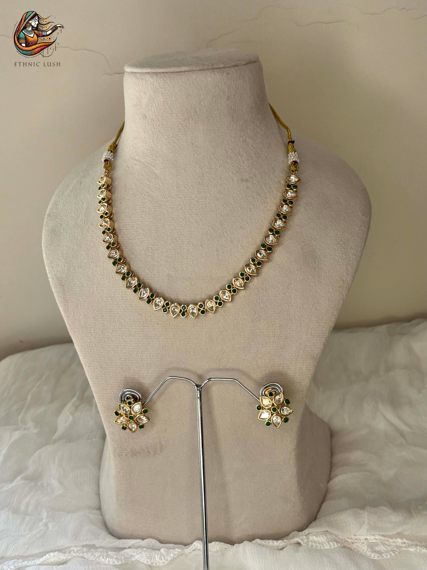 Kundan Necklace and Earrings Set with Green Accents