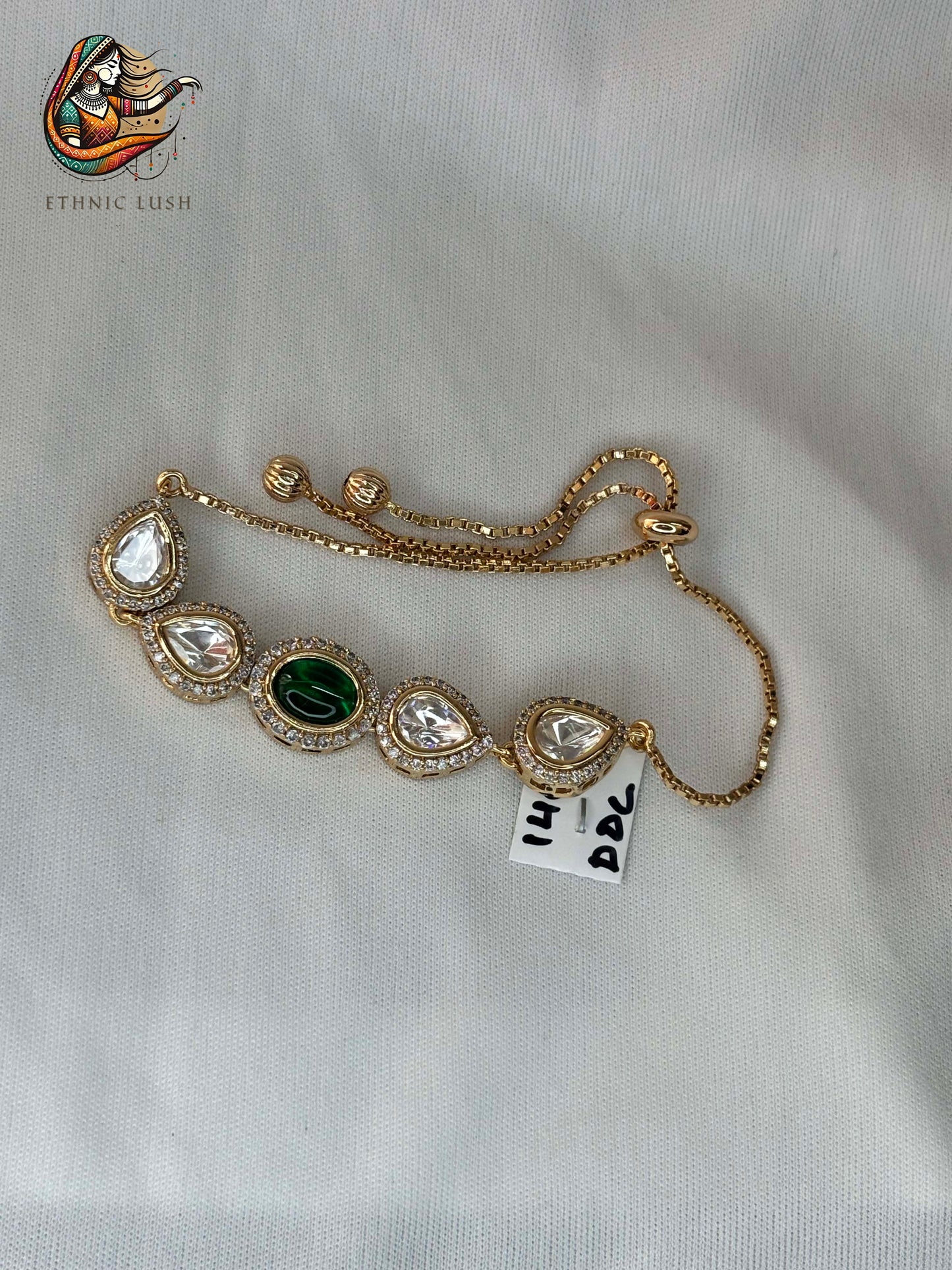 Gold Adjustable Teardrop Bracelet with Crystal and Emerald Accents