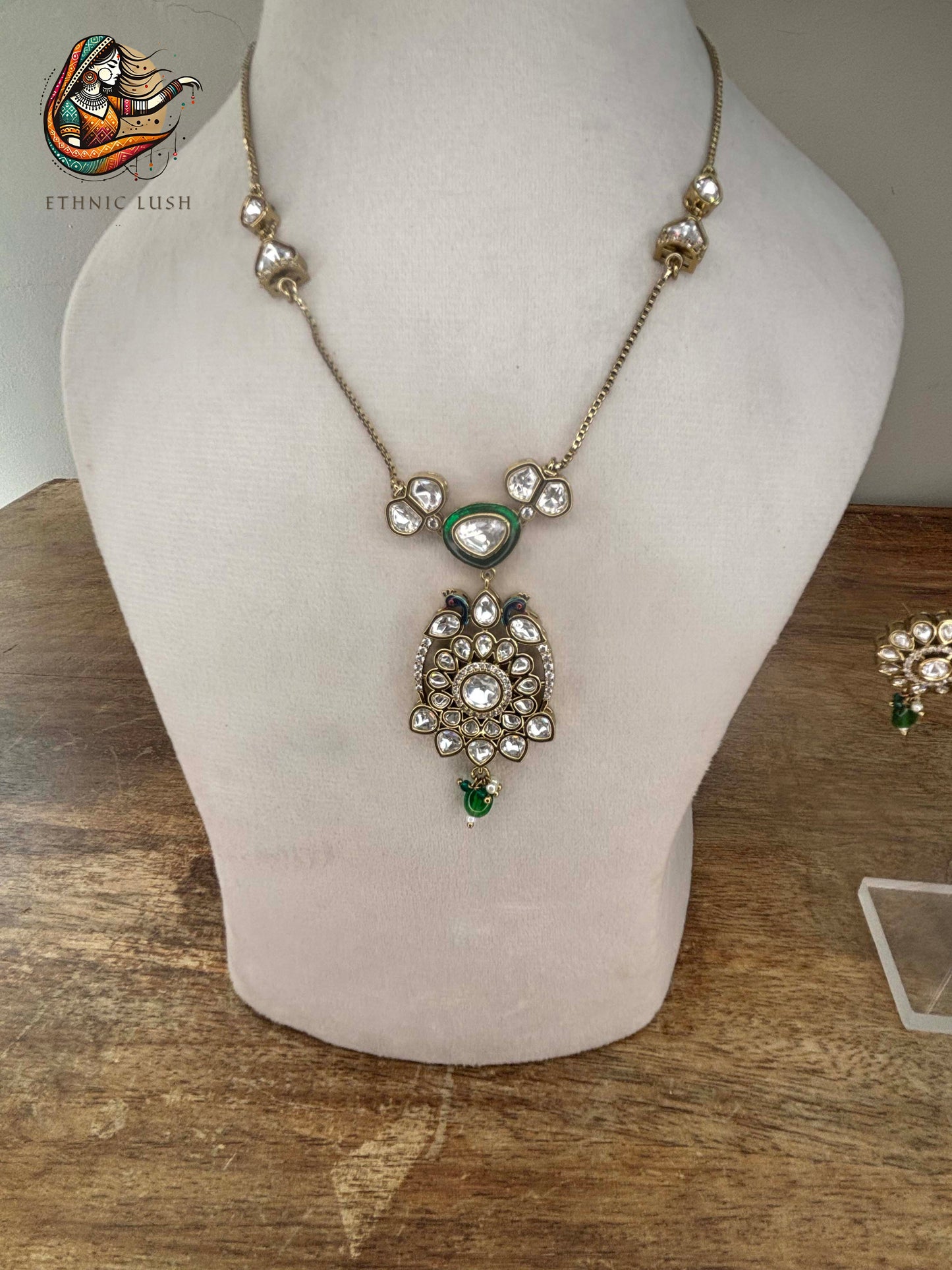 Kundan Necklace and Earrings Set with Green Accents