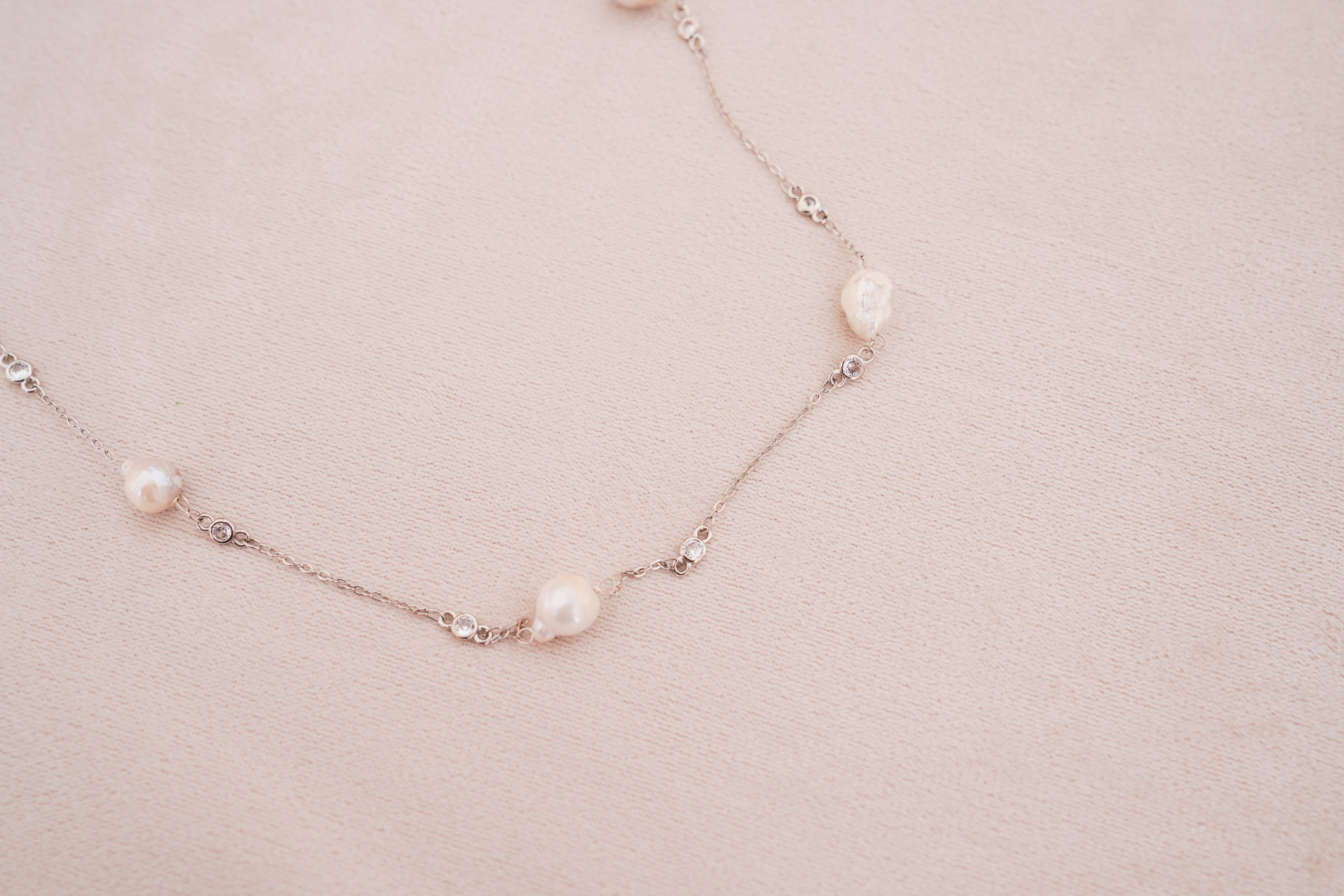 Minimal Luminous Freshwater Pearl Cascade Necklace in Silver Finish