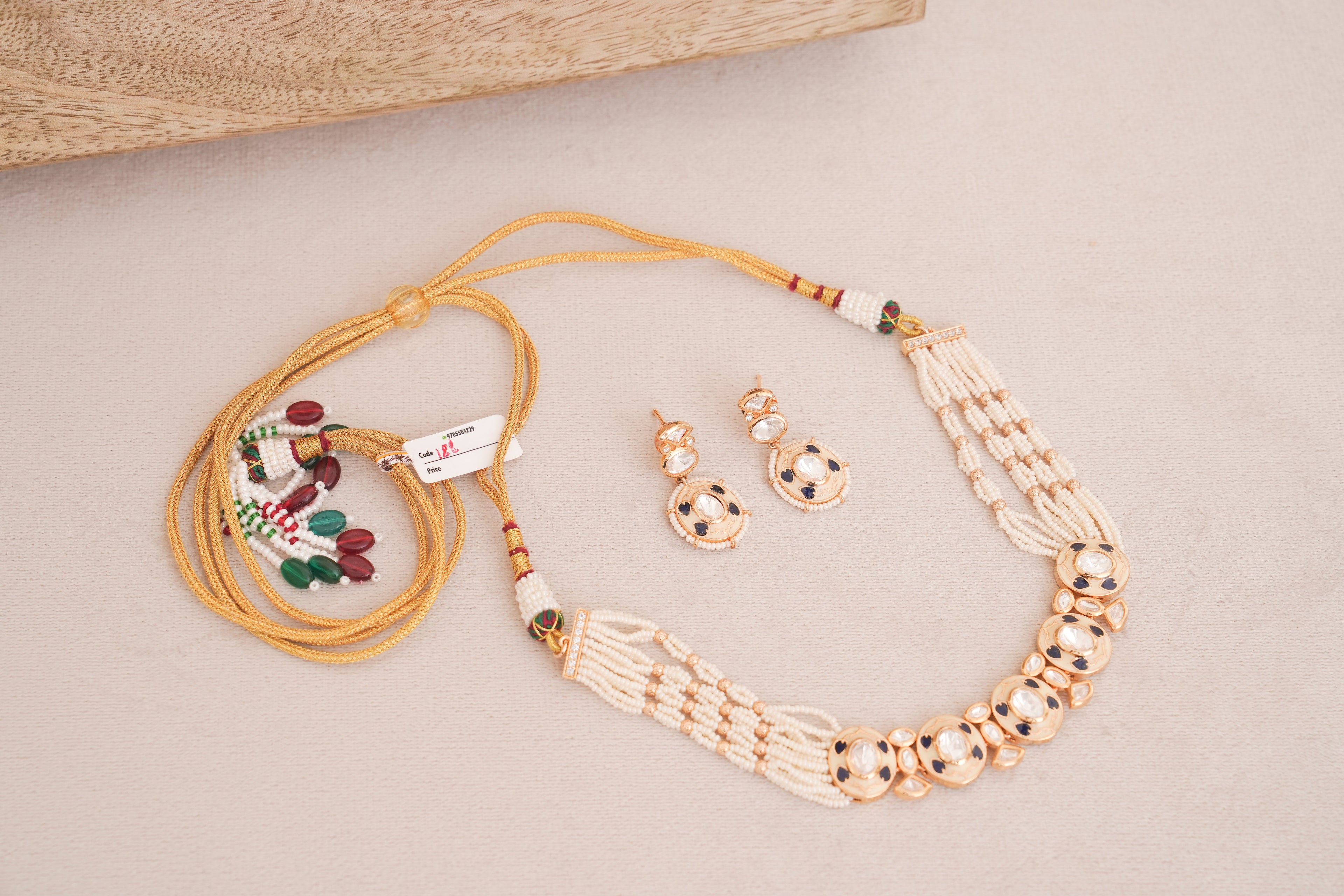 Regal Black Meenakari Kundan Pearl Piroyi Choker Set
