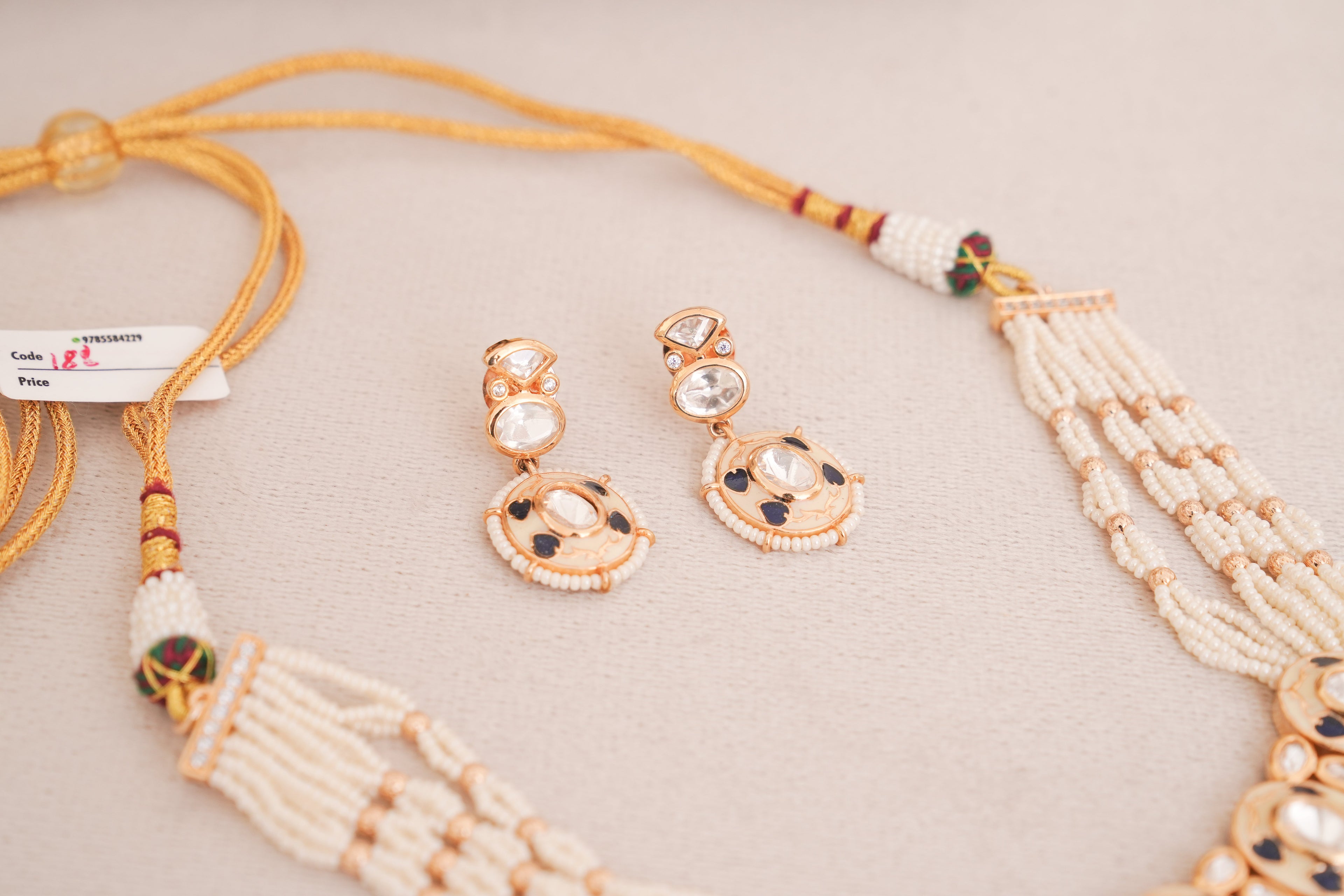 Regal Black Meenakari Kundan Pearl Piroyi Choker Set