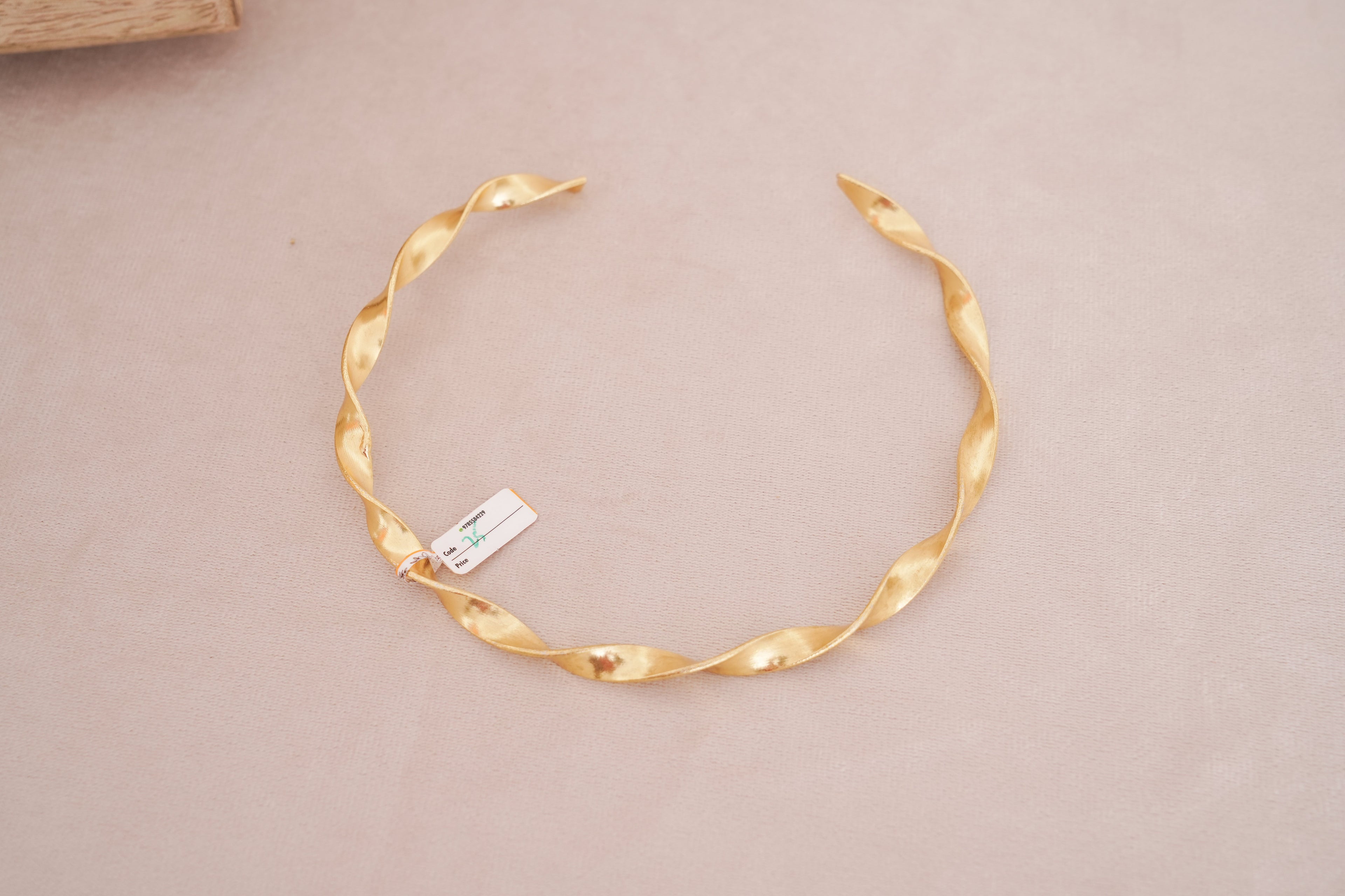 Twisted Gold Ribbon Choker With Ruby Accents